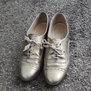 Kate Spade Shimmering Gold Brogue Flats